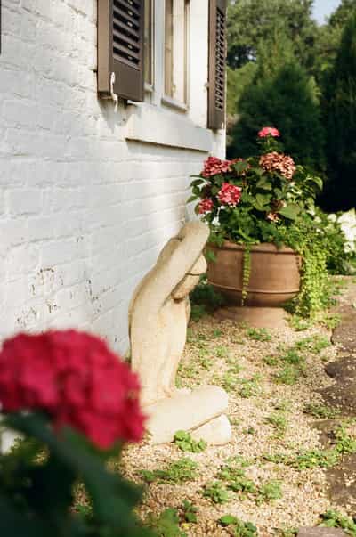Stone statue captured in natural light on ColorPlus 200 film